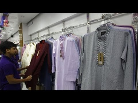 ঈদ বাজারে রেডিমেড পাঞ্জাবি থ্রিপিস কেনার ধুম ঈদ বাজারে রেডিমেড পাঞ্জাবি থ্রিপিস কেনার ধুম