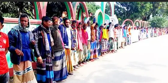 নওগাঁর মান্দায় বাঁধ কেটে ধান নষ্ট ॥ ভূমিহীনদের মানববন্ধন নওগাঁর মান্দায় বাঁধ কেটে ধান নষ্ট ॥ ভূমিহীনদের মানববন্ধন