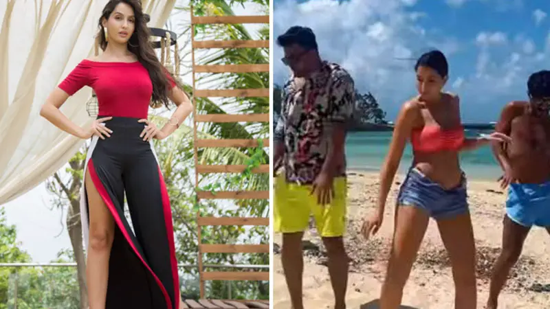 দুই পুরুষ সঙ্গী নিয়ে সৈকতে উদ্দাম নাচ নোরার দুই পুরুষ সঙ্গী নিয়ে সৈকতে উদ্দাম নাচ নোরার