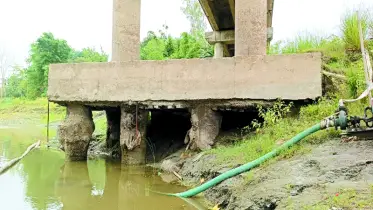 সাটুরিয়ায় পিলারের মাটি ধসে হুমকিতে সেতু