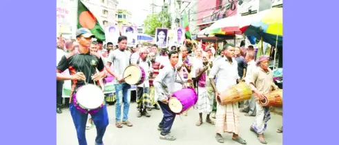 রাজশাহীতে আদিবাসী পরিষদের  নয় দফা দাবিতে র‌্যালি