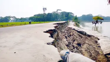 দুই দপ্তরের ঠেলাঠেলি নদীতে বিলীন সড়ক