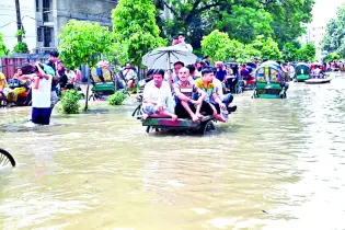 প্রবল বর্ষণে প্রায়  অচল রাজধানী  বন্ধ মার্কেট