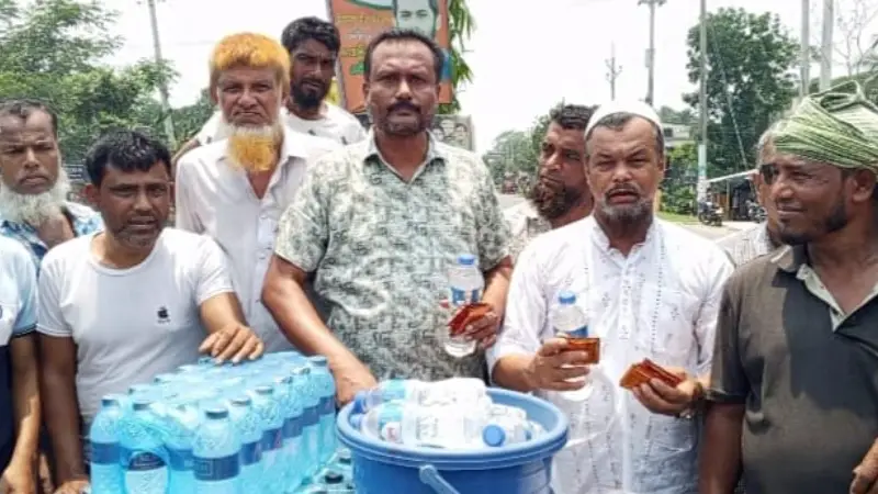 গরমে শ্রমিকদের পাশে শ্রমিকদল: মাদারীপুরে পানীয় ও স্যালাইন বিতরণ গরমে শ্রমিকদের পাশে শ্রমিকদল: মাদারীপুরে পানীয় ও স্যালাইন বিতরণ