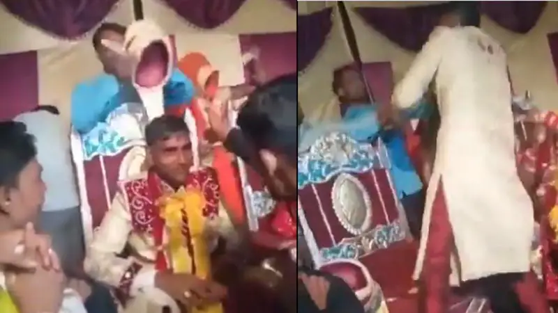 বিয়ের মঞ্চে পাত্রকে উত্ত্যক্ত পেটালেন বর! বিয়ের মঞ্চে পাত্রকে উত্ত্যক্ত পেটালেন বর!