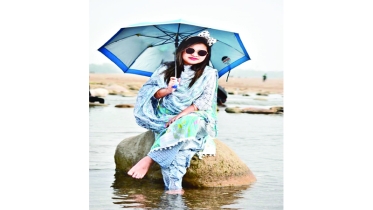 রোদ বৃষ্টির ছাতা