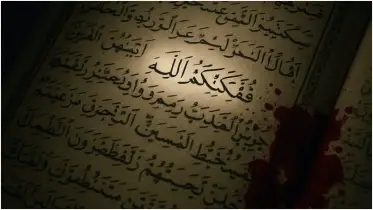 কুরআনের পাশে খলিফার রক্ত