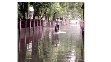 রাজশাহী আইএইচটি এলাকায় জলাবদ্ধতায় পোহাতে হচ্ছে নিয়মিত দুর্ভোগ