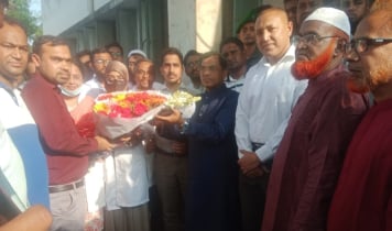 মুকসুদপুর স্বাস্থ্য কমপ্লেক্সে টিকিট কেটে সেবা নিলেন এমপি সেলিম